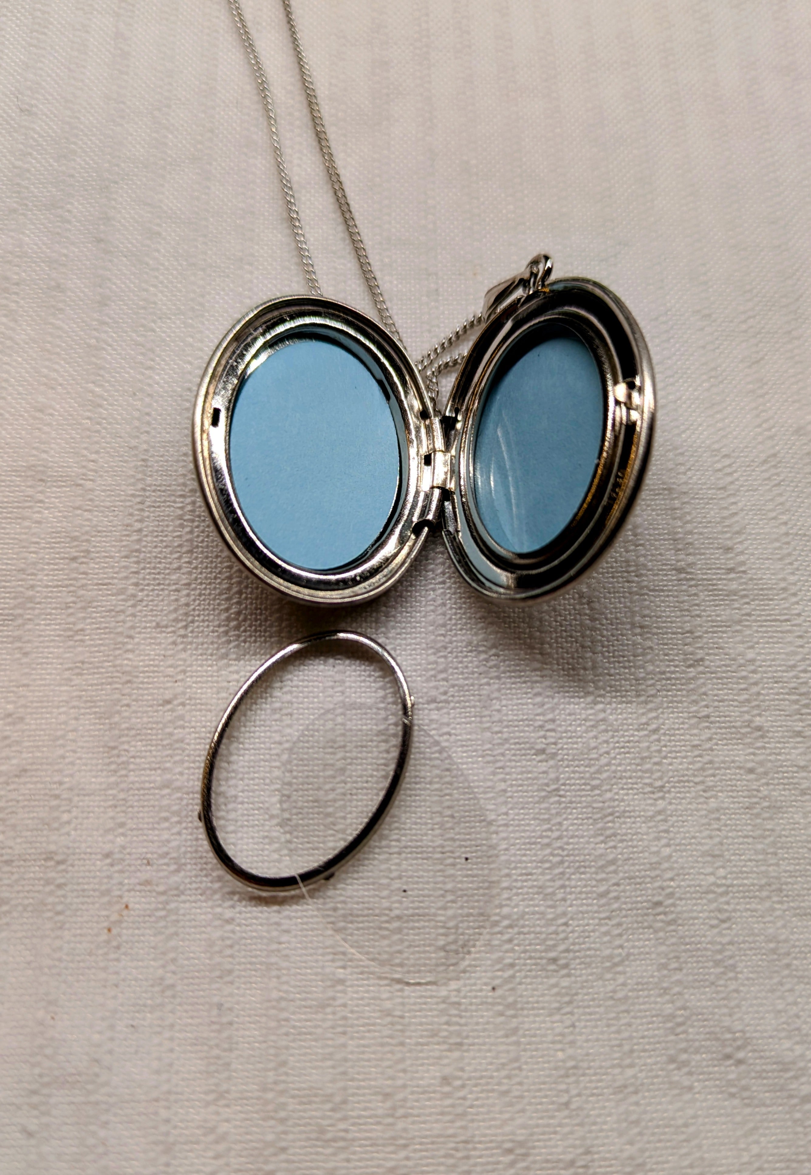 Locket with dolphins  sterling silver